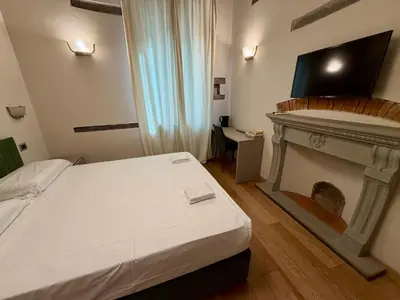 TV o dispositivi per l'intrattenimento presso Serragli Luxury Casa Di Annusca