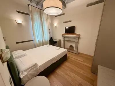 Letto o letti in una camera di Serragli Luxury Casa Di Annusca