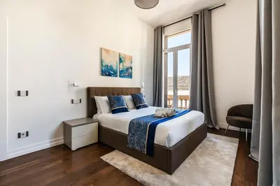 Letto o letti in una camera di Noè Luxe Home with Parking on Request