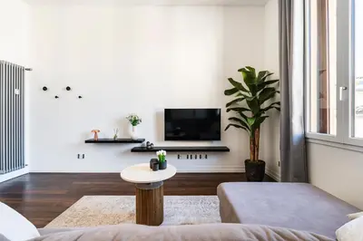 TV o dispositivi per l'intrattenimento presso Noè Luxe Home with Parking on Request