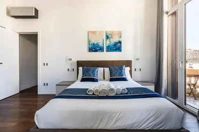 Letto o letti in una camera di Noè Luxe Home with Parking on Request