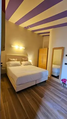 Letto o letti in una camera di Select Executive Residence