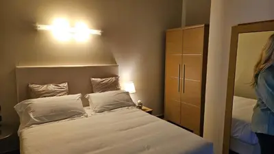 Letto o letti in una camera di Select Executive Residence