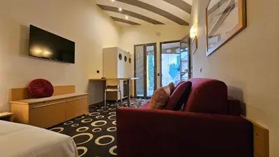 TV o dispositivi per l'intrattenimento presso Select Executive Residence