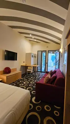 TV o dispositivi per l'intrattenimento presso Select Executive Residence