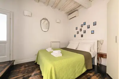 Letto o letti in una camera di Agnolo