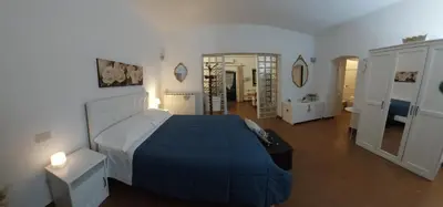 Letto o letti in una camera di La Piccola Oasi con parcheggio