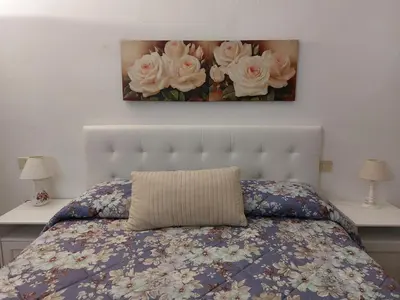 Letto o letti in una camera di La Piccola Oasi con parcheggio