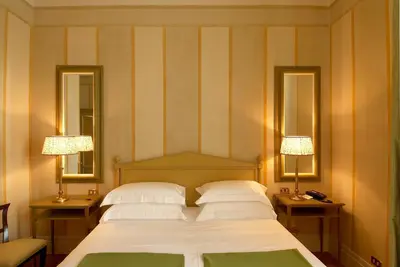 Letto o letti in una camera di Antica Torre Tornabuoni