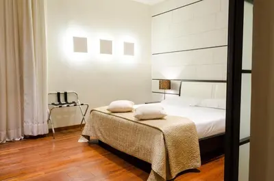 Letto o letti in una camera di Antica Torre Tornabuoni