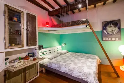 Letto o letti in una camera di Diladdarno