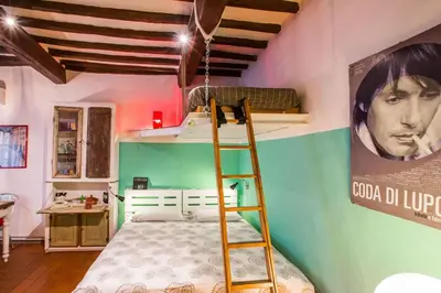 Letto o letti in una camera di Diladdarno