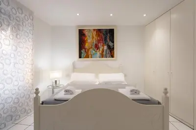 Letto o letti in una camera di Firenze Rentals - Por Santa Maria