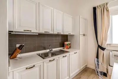 Cucina o angolo cottura di Apartments Florence Borgo dei Greci
