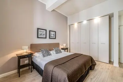 Letto o letti in una camera di Apartments Florence Borgo dei Greci