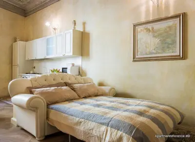 Letto o letti in una camera di Apartments Florence Ghibellina Balcony
