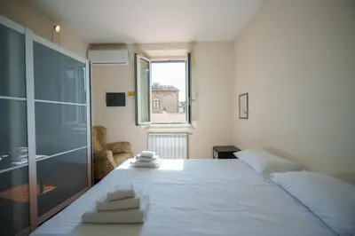Letto o letti in una camera di Anguillara in the Heart of Florence