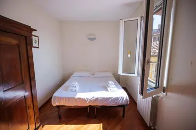 Letto o letti in una camera di Anguillara in the Heart of Florence