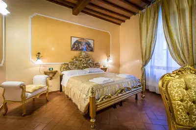 Letto o letti in una camera di Soggiorno Annamaria
