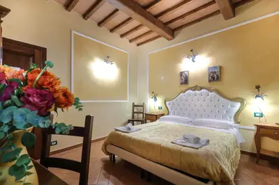 Letto o letti in una camera di Soggiorno Annamaria