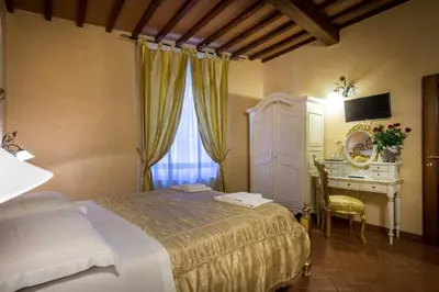 Letto o letti in una camera di Soggiorno Annamaria