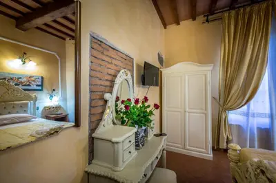 Letto o letti in una camera di Soggiorno Annamaria