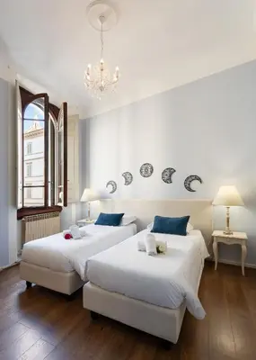 Letto o letti in una camera di Keys of Italy - Speziali 1 - Deluxe 2 bedroom flat nearby Piazza Repubblica