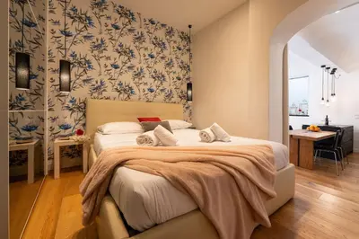 Letto o letti in una camera di Keys of Italy - Alpha Beta Gamma - Tornabuoni 5 - Luxury apartments in the fashion district