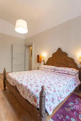Letto o letti in una camera di Apartment Vespucci- quite Historic Palace