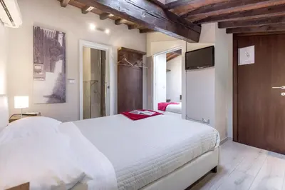 Letto o letti in una camera di Home Boutique Santa Maria Novella