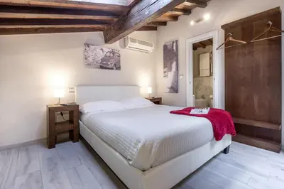 Letto o letti in una camera di Home Boutique Santa Maria Novella