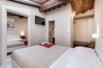 Letto o letti in una camera di Home Boutique Santa Maria Novella