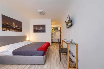 Letto o letti in una camera di Home Boutique Santa Maria Novella