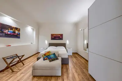 Letto o letti in una camera di Home Boutique Santa Maria Novella