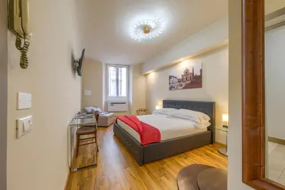 Letto o letti in una camera di Home Boutique Santa Maria Novella