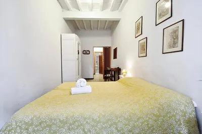 Letto o letti in una camera di Castellani Apartment