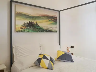 Letto o letti in una camera di Firenze Rentals Suite Cavour
