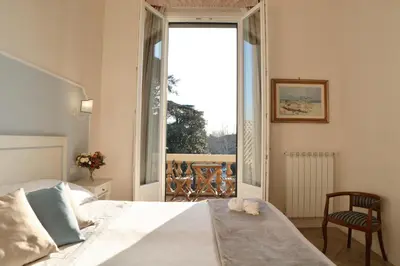 Letto o letti in una camera di Dimora Salviati