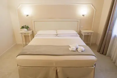 Letto o letti in una camera di Dimora Salviati