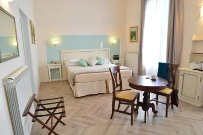 Letto o letti in una camera di Dimora Salviati