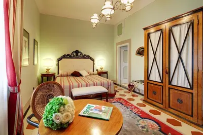 Letto o letti in una camera di Villa Il Sasso - Dimora d'Epoca