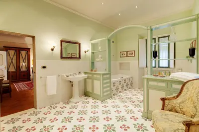 Letto o letti in una camera di Villa Il Sasso - Dimora d'Epoca