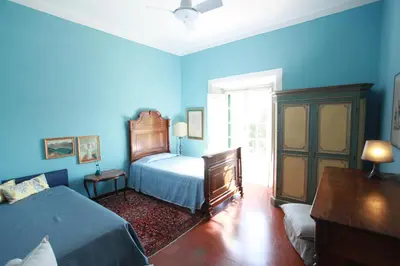Letto o letti in una camera di Villa Acacia