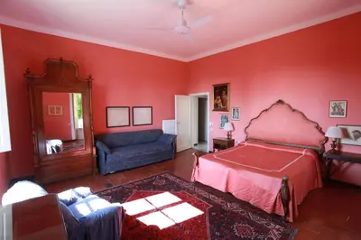 Letto o letti in una camera di Villa Acacia