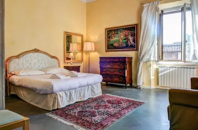 Letto o letti in una camera di Casa di Dante-Roof Terrace