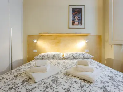 Letto o letti in una camera di Apartments Florence - Alfani Michelangelo