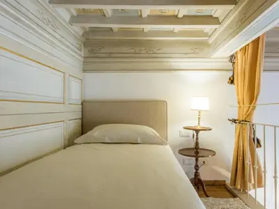 Letto o letti in una camera di Apartments Florence - Orsanmichele view