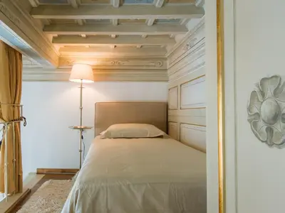 Letto o letti in una camera di Apartments Florence - Orsanmichele view