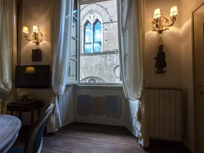 Area soggiorno di Apartments Florence - Orsanmichele view