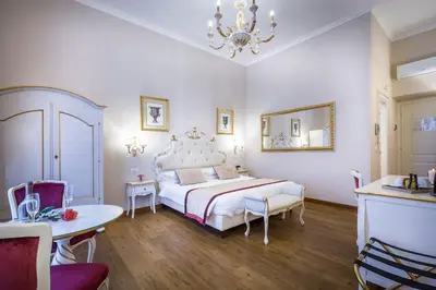 Letto o letti in una camera di B&B La Terrazza Sul Duomo